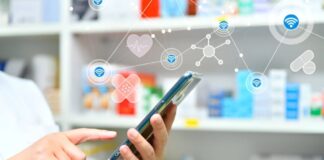 How Doctors Can Use Digital Marketing to Attract More Patients in 2026 Pharmacist using digital tablet to manage prescriptions in a modern pharmacy—representing how healthcare professionals use digital marketing tools to attract patients in 2026